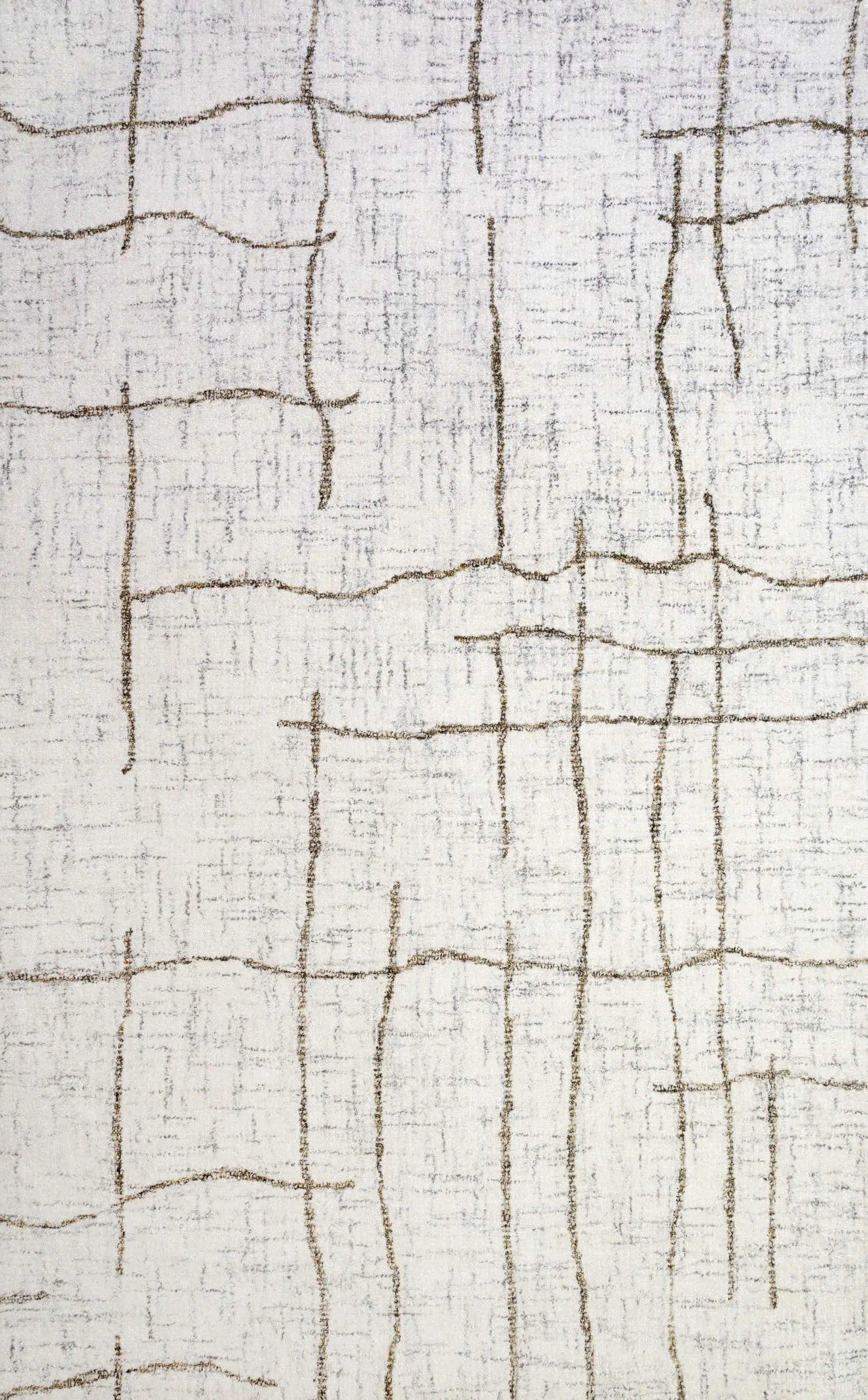 Beige rug with irregular brown vertical and horizontal lines forming a geometric pattern in cream. (Close-up textile)