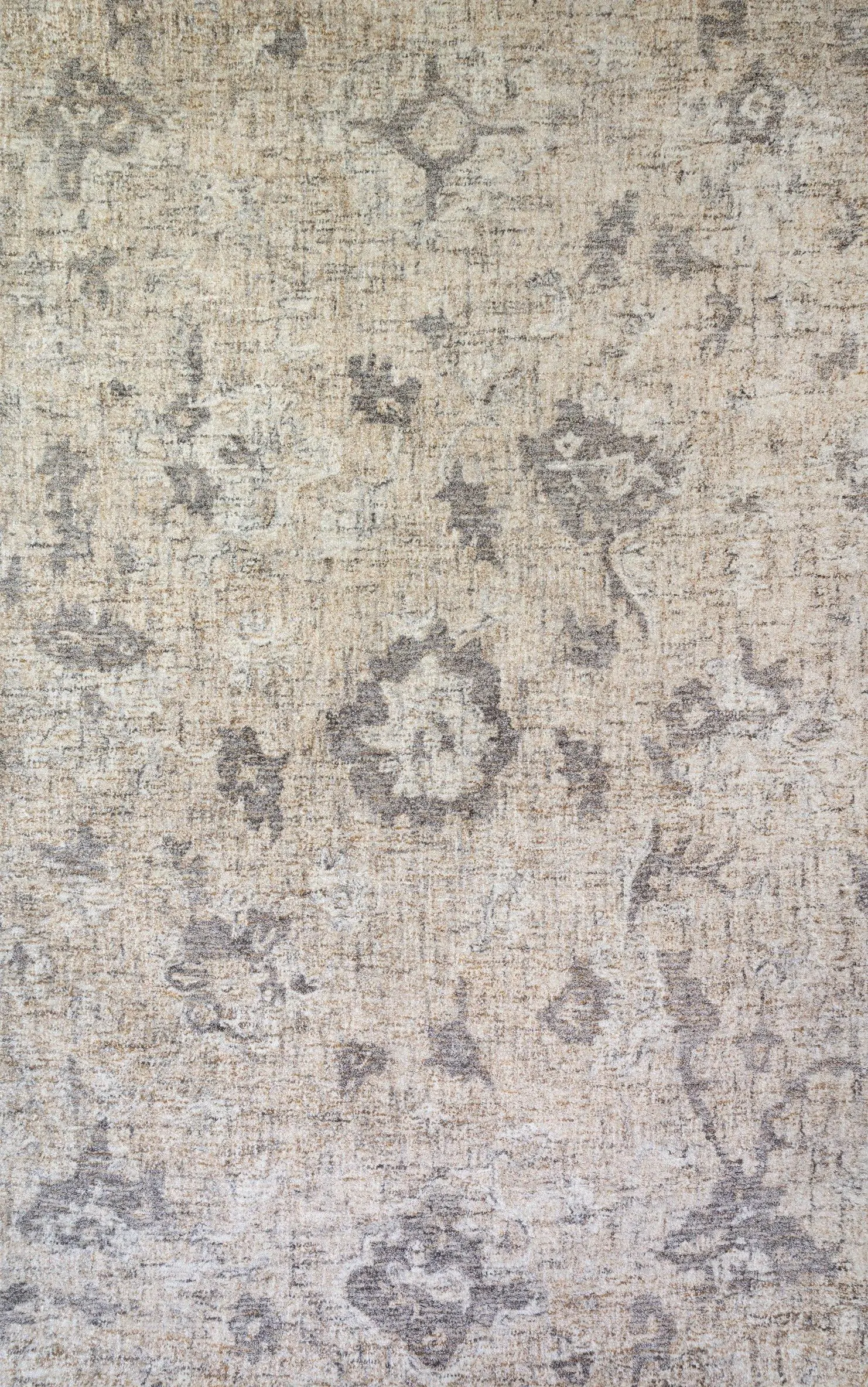 Faded beige and gray oriental rug with a distressed floral pattern (vintage style).