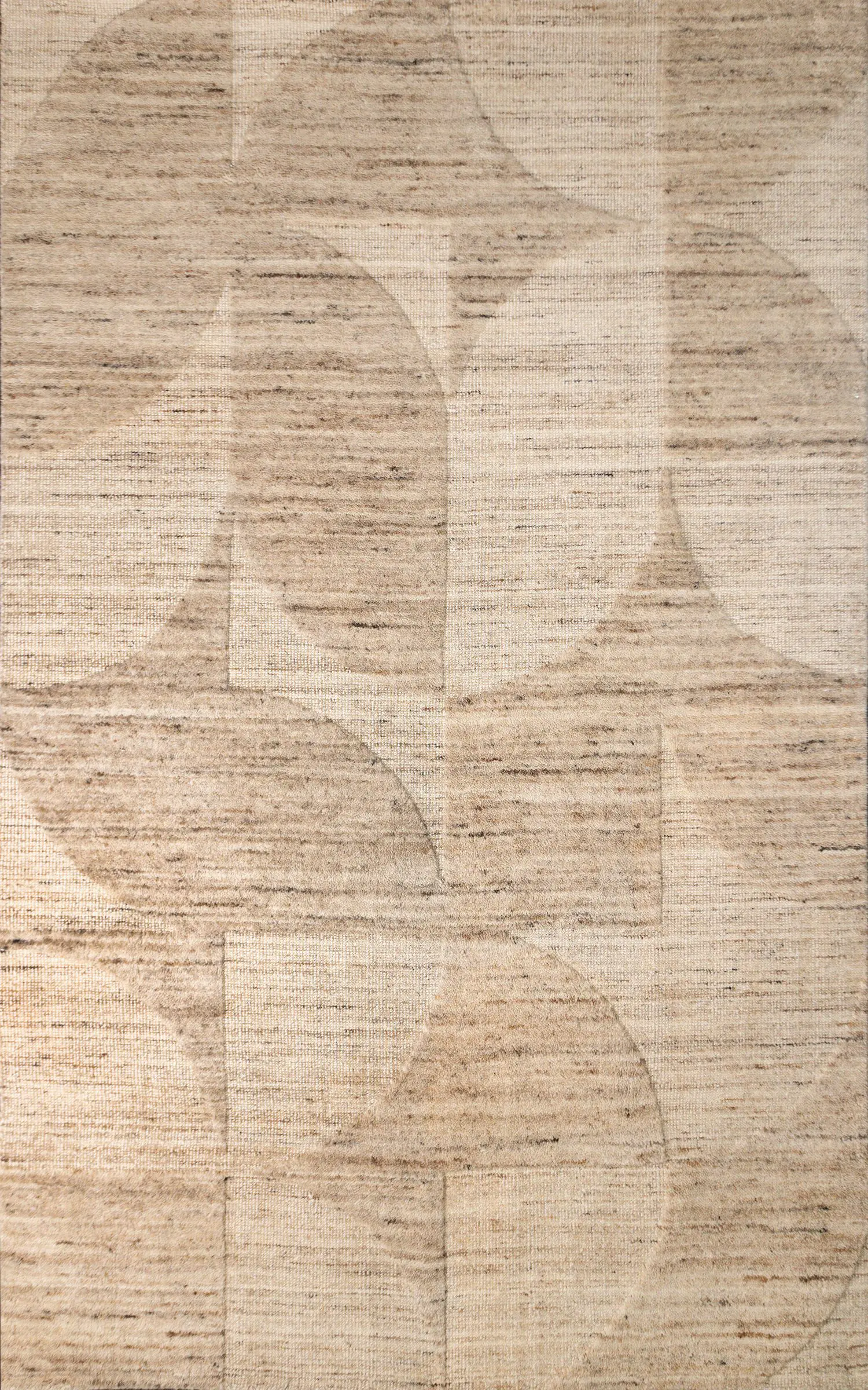 Beige textured rug with large overlapping circular patterns in light brown.