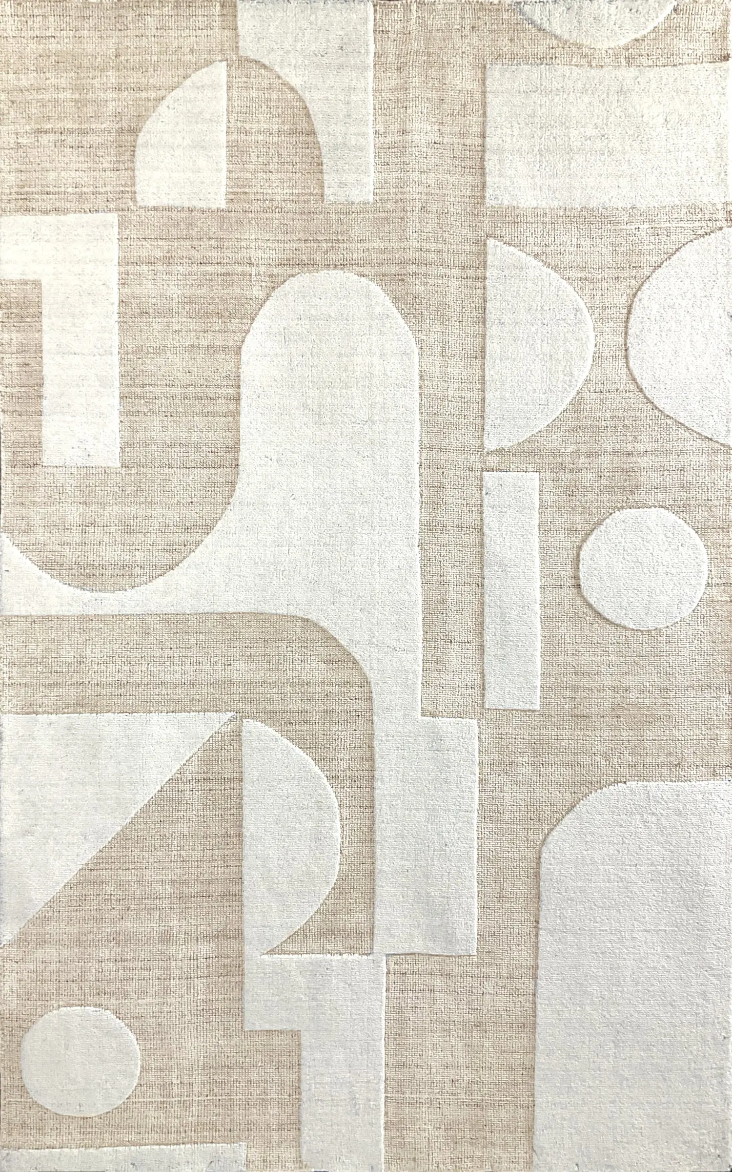 Abstract geometric rug pattern in beige and cream with circles, arches and rectangles at the close-up texture level.